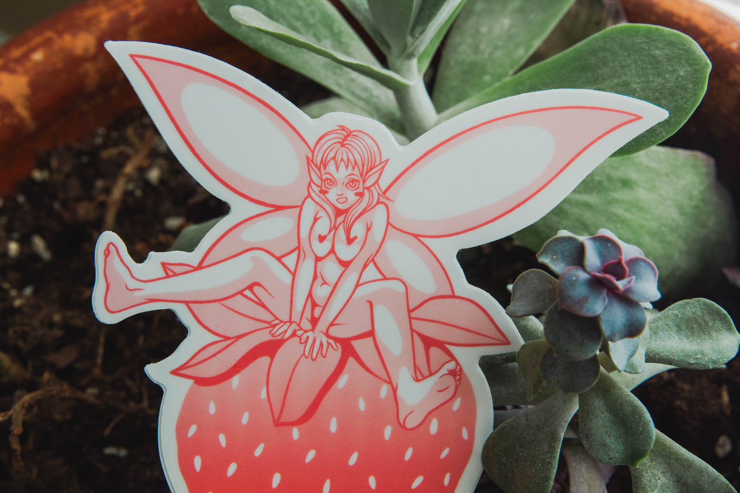 Cute and sexy fairy straddling a strawberry in a sexually suggestive manner, nsfw anime fairy sticker